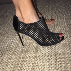 black open toed bottle high heels